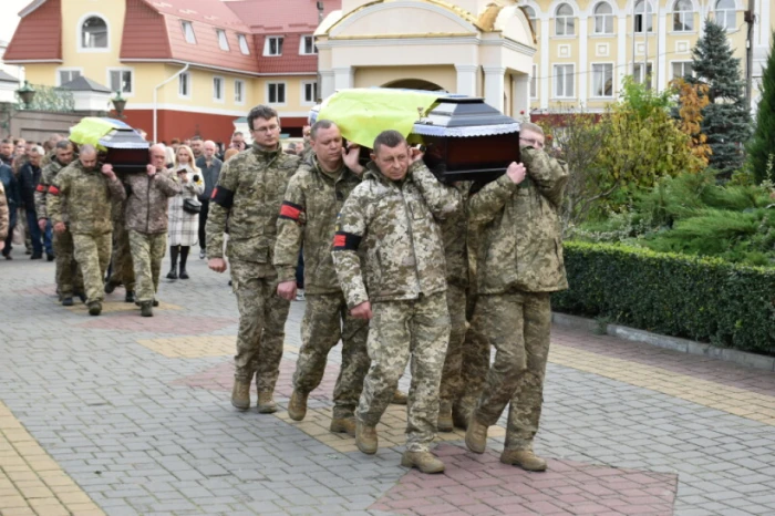 У Луцьку попрощалися з Юрієм Трушиком та Олександром Руміним