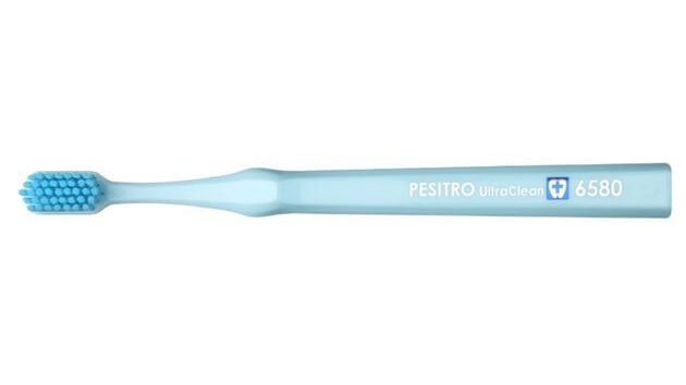 класична зубна щітка