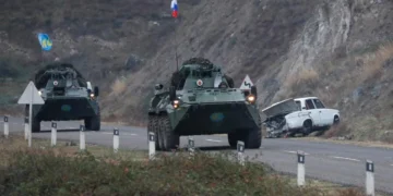 Прапори Грузії та окупованого регіону на кордоні