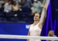 Тенісистка святкує очко на кортовому покритті US Open