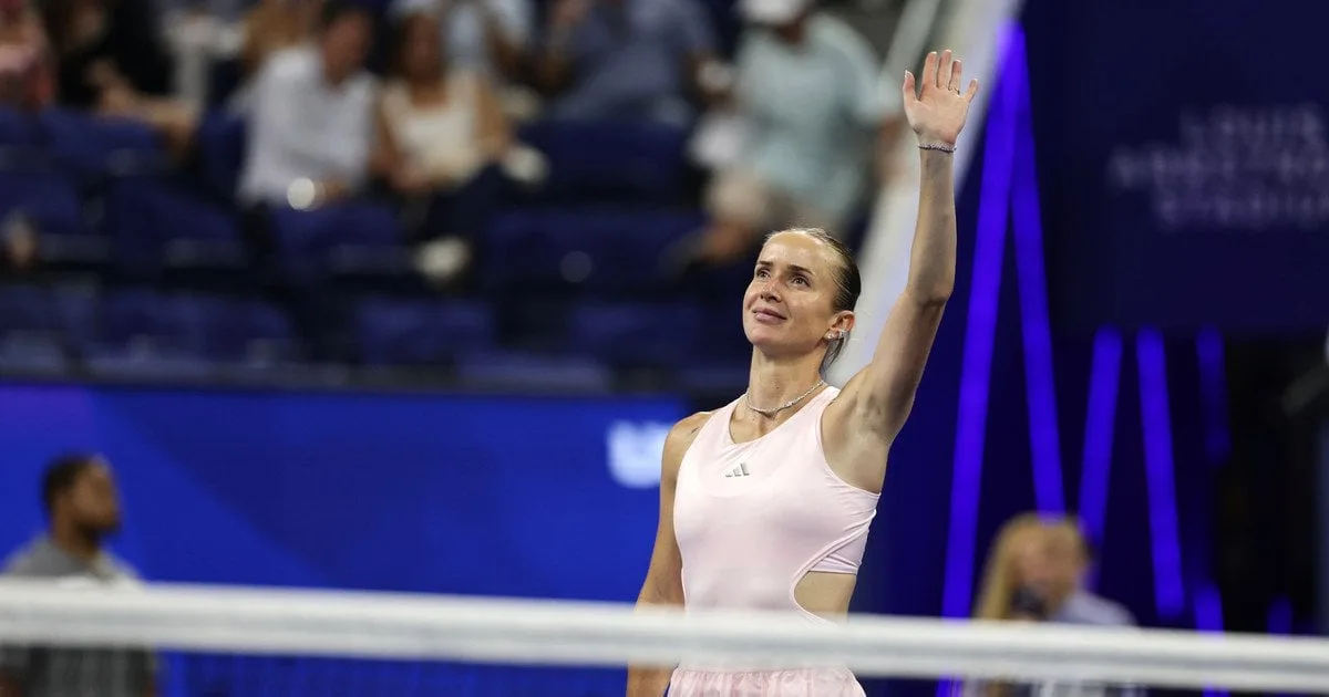 Тенісистка святкує очко на кортовому покритті US Open